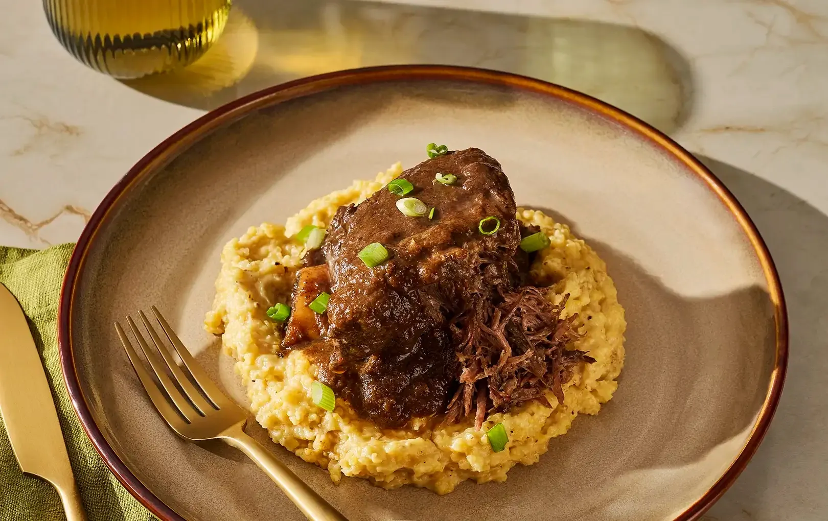 Jerk Braised Short Ribs with Grits in Bowl