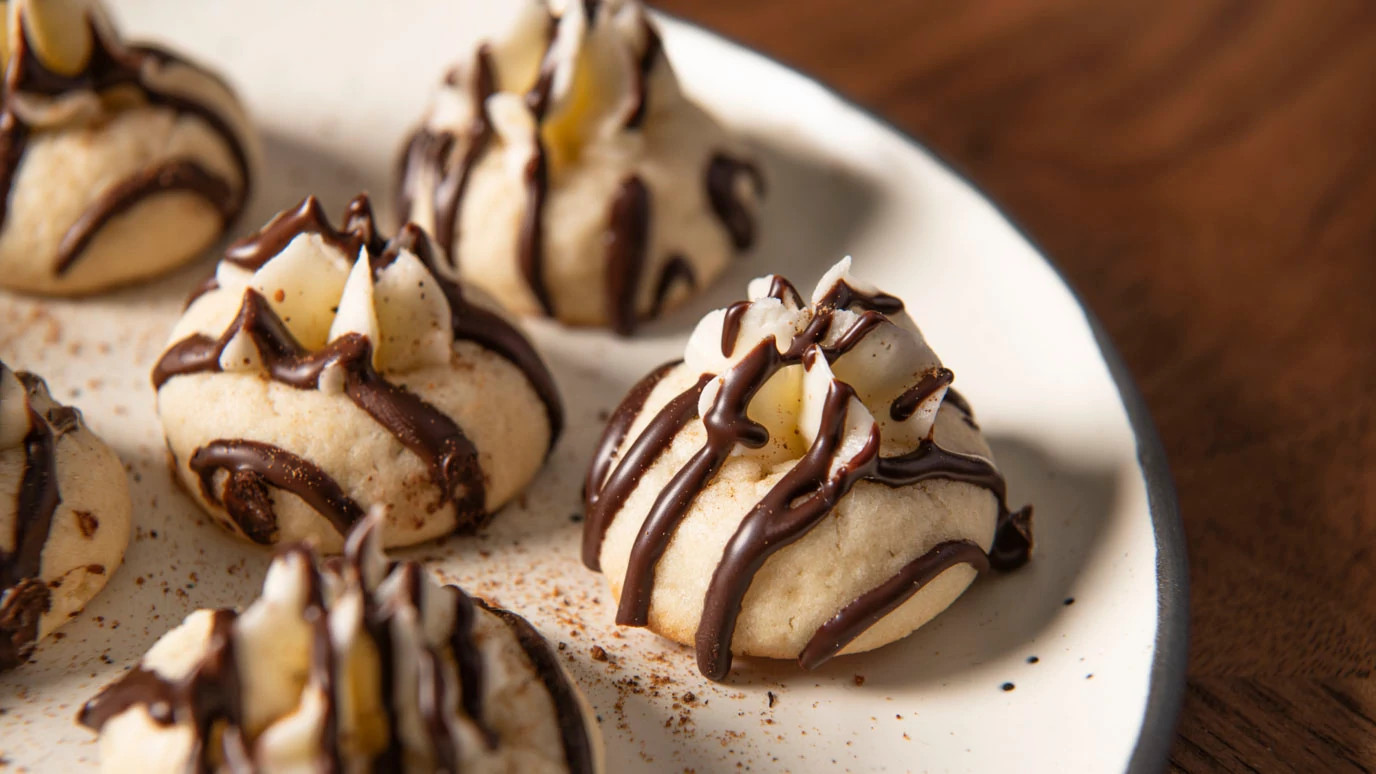 Chocolate Drizzled Eggnog Thumbprint Cookies