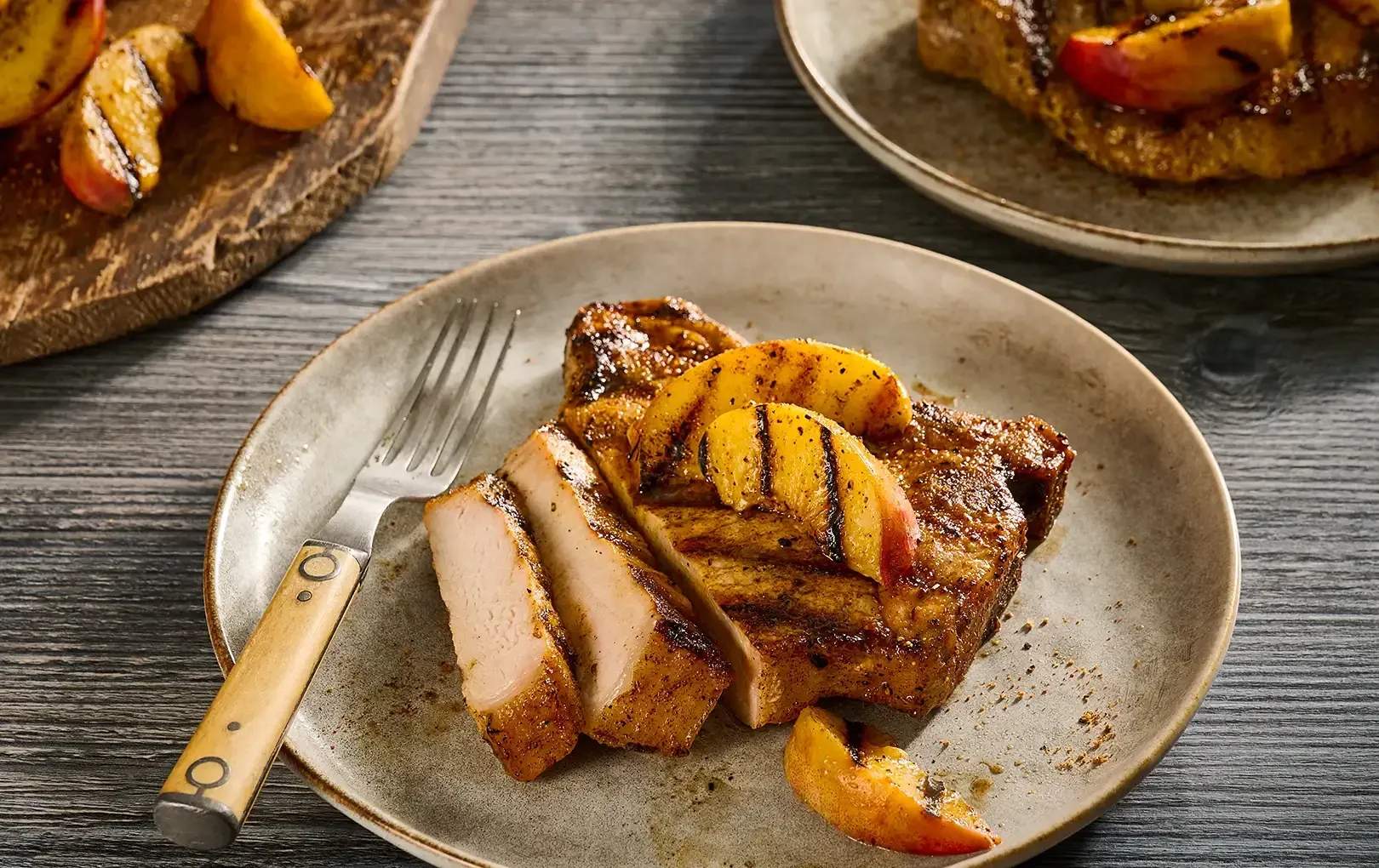 Tennessee Whiskey Honey Glazed Pork Chops with Peaches