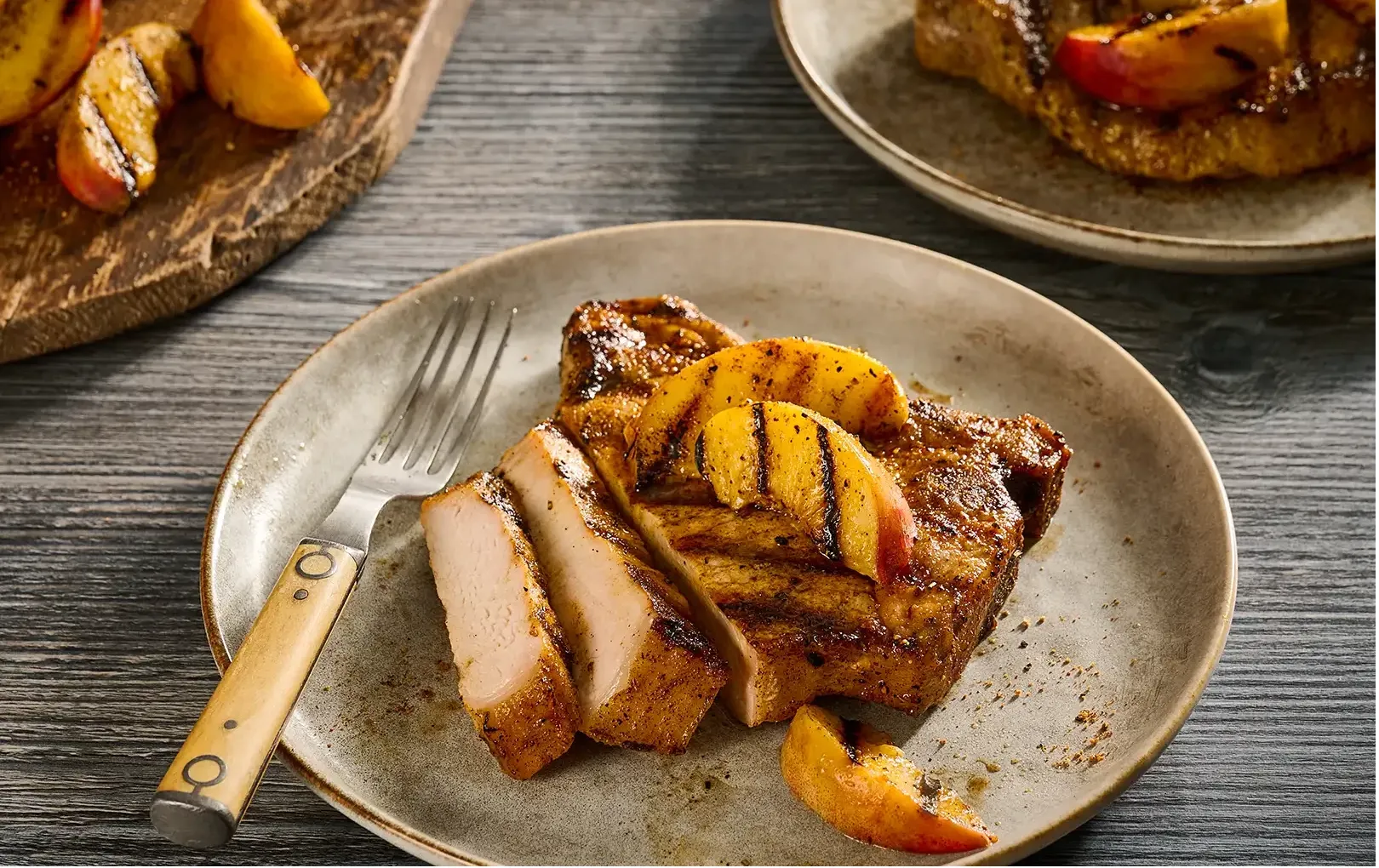 Tennessee Whiskey Honey Glazed Pork Chops with Peaches