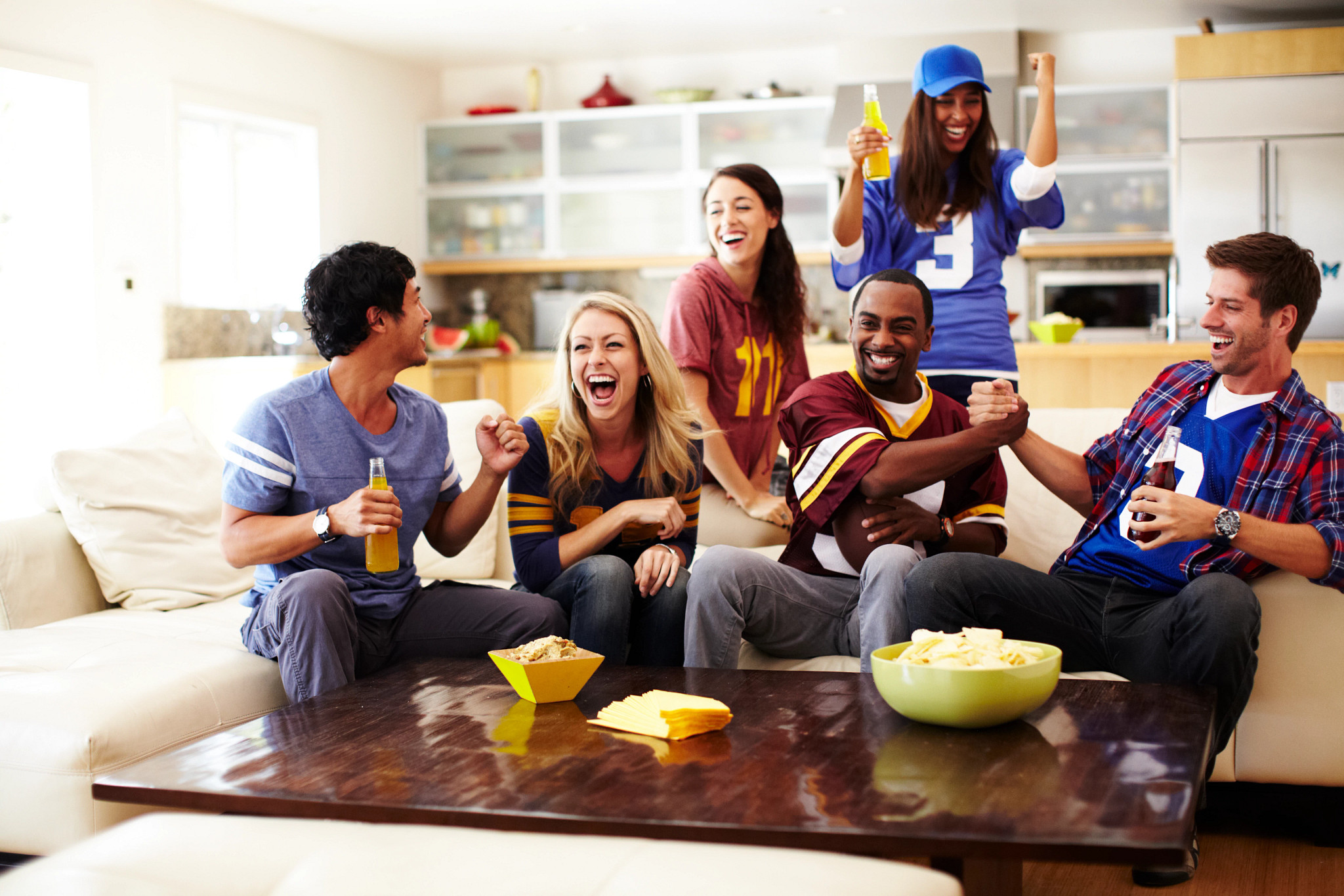 Football Fans Celebrating at Home