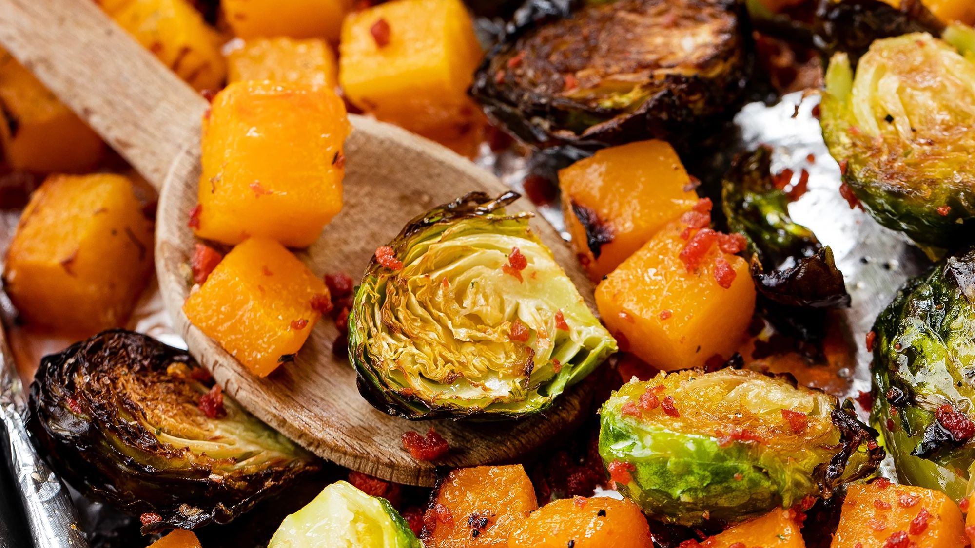 Roasted Butternut Squash and Brussels Sprouts with Bacon Bits