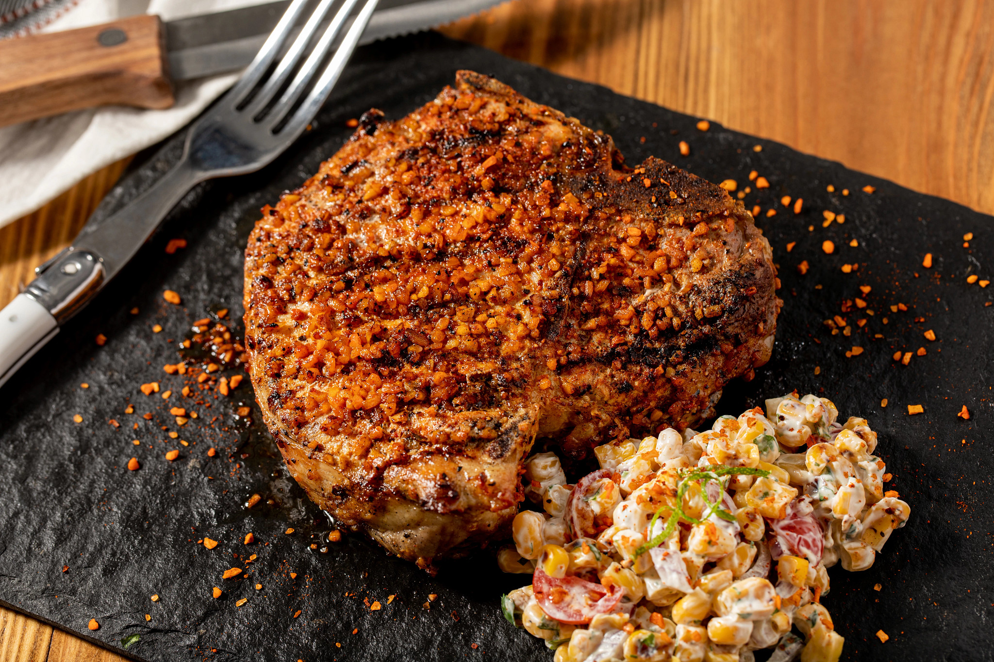 Grilled Pork Porterhouse with Creamy Corn Salad Grill Mates