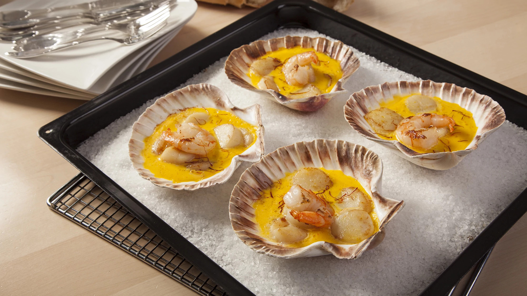 Capesante con gamberi e crema allo zafferano