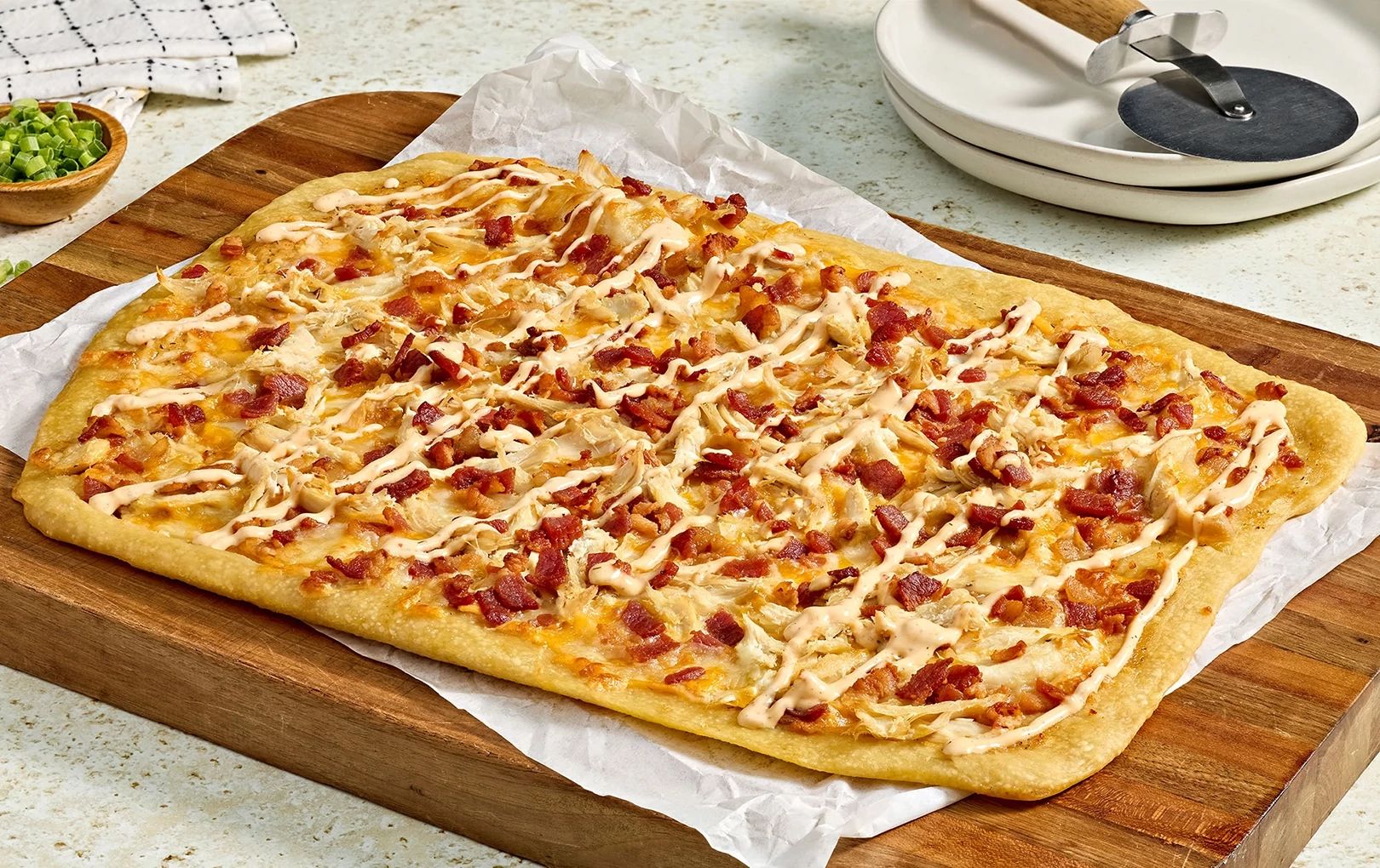 Spicy Chicken Bacon Ranch Sheet Pan Pizza