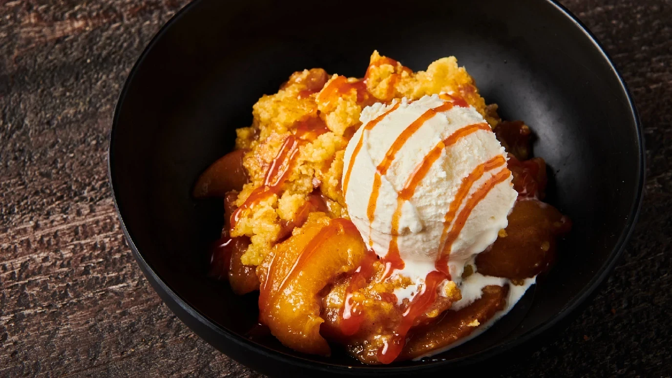 Hot Honey Peaches and Cream Dump Cake